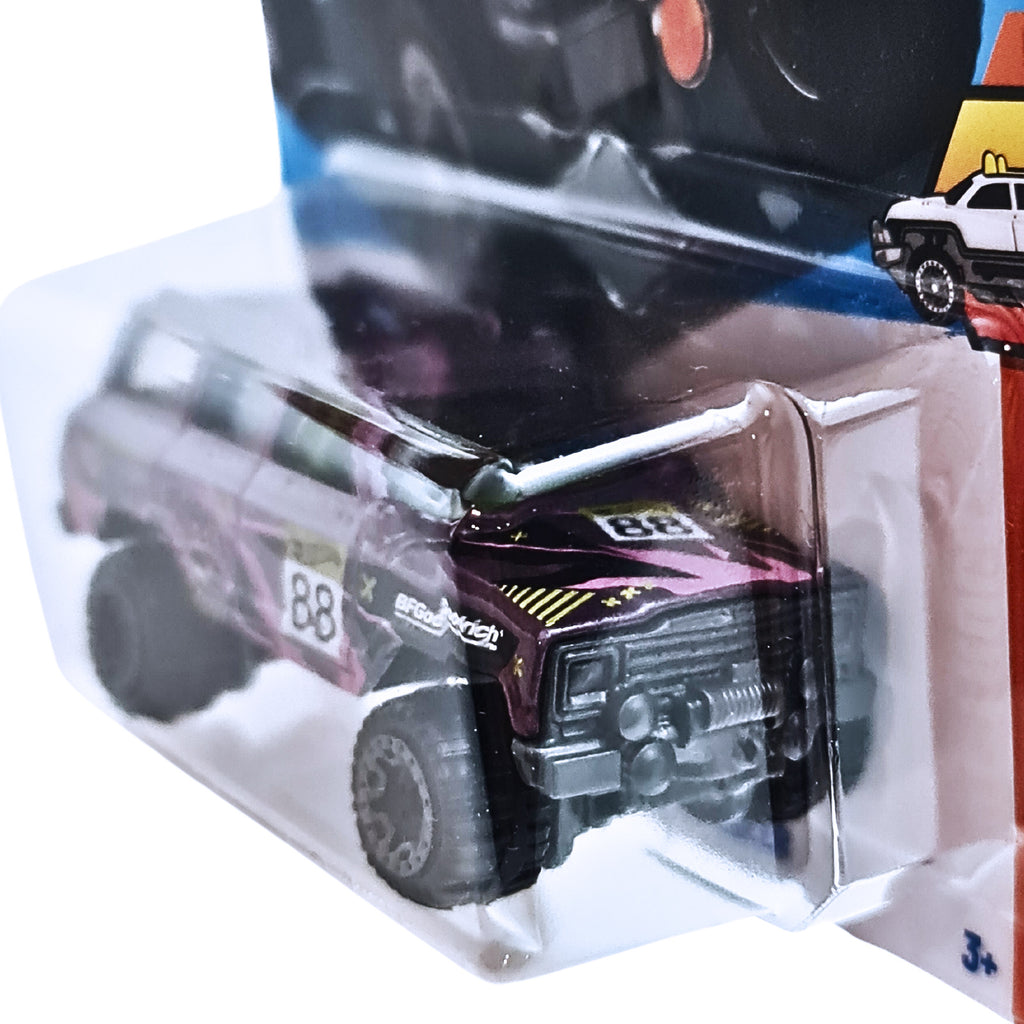 Hot Wheels HW HOT TRUCKS | 1988 Jeep Wagoneer - Purple (44/250)