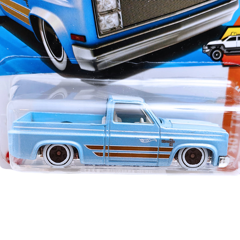 Hot Wheels HW HOT TRUCKS | '83 Chevy Silverado - Baby Blue (157/250)