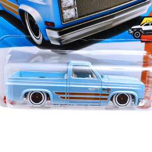 Hot Wheels HW HOT TRUCKS | '83 Chevy Silverado - Baby Blue (157/250)